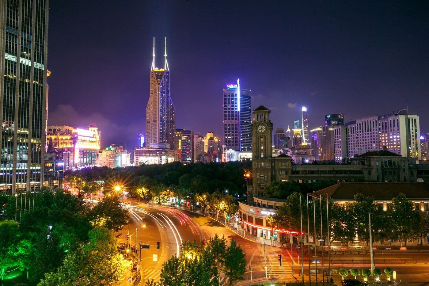 Illuminated Shanghai skyline over the Huangpu river at night